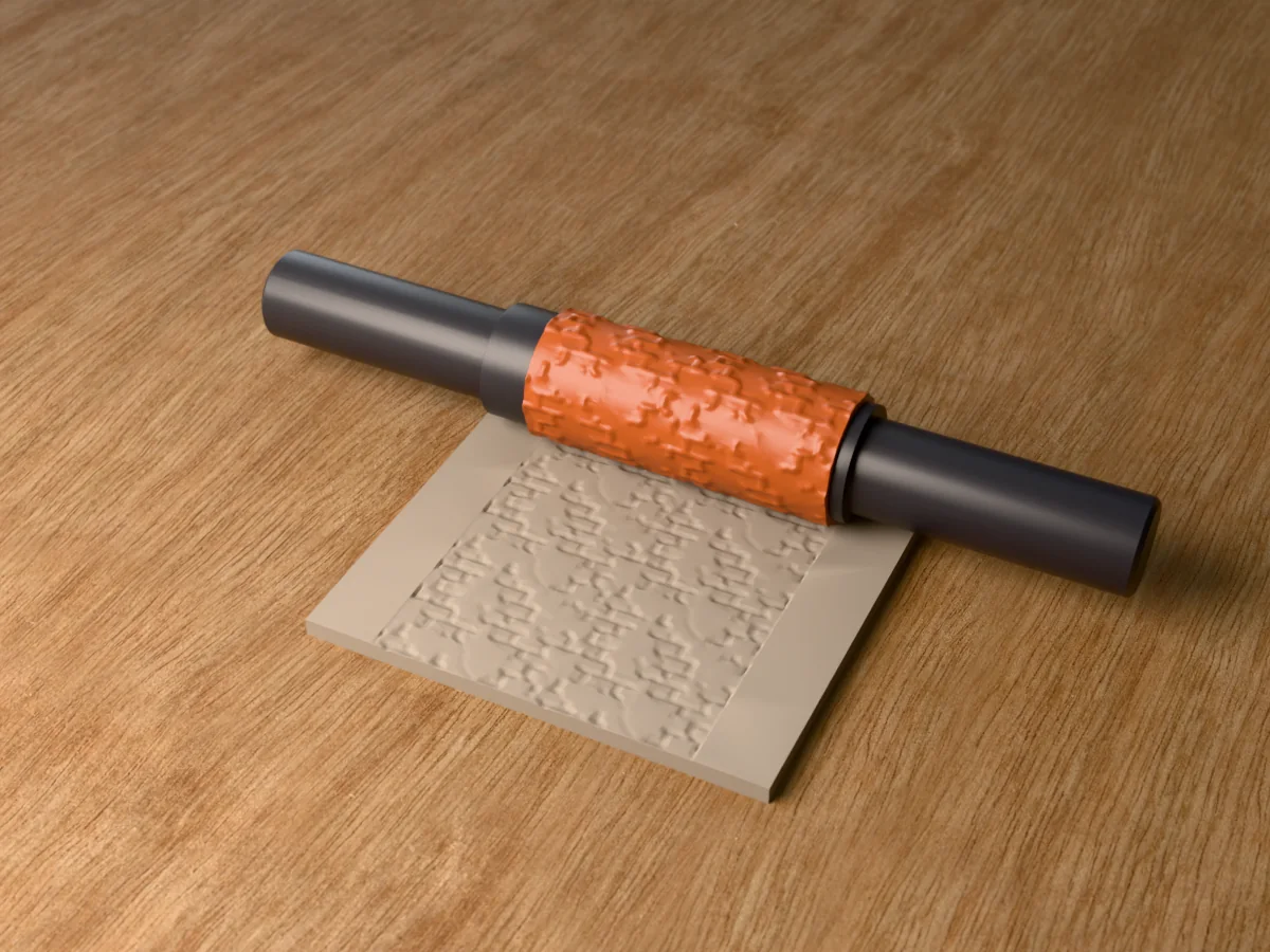 3D render of the printed ruined plaster wall textured rolling pin, its patterned sleeve between two dark handles, resting on a slab of clay it has pressed with broken plaster over brickwork