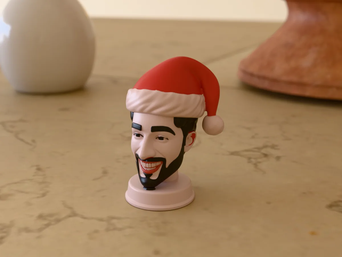 3D render of a 3D-printed bust of a guy with a black beard in a Santa hat, painted in 6 colours, on a table