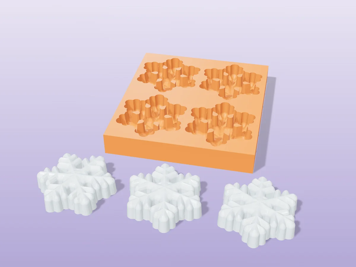 3D render of a printed orange tray with four snowflake soap cavities, and three icy white snowflake soaps in front