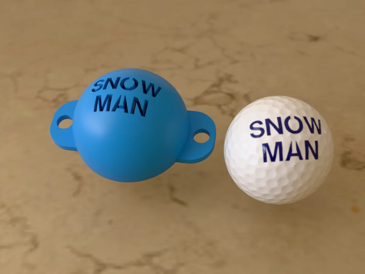 3D render of a blue 3D-printed golf ball stencil with SNOWMAN cut through it, sitting on a golf ball, next to a ball marked with SNOWMAN in blue