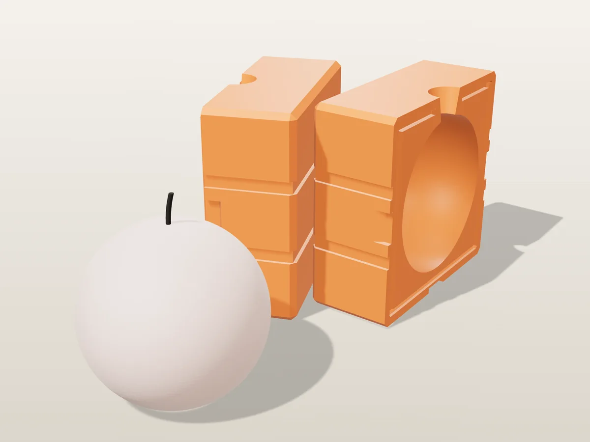 3D render of a blush pink sphere candle in front of the two printed halves of its rigid orange and grey mold