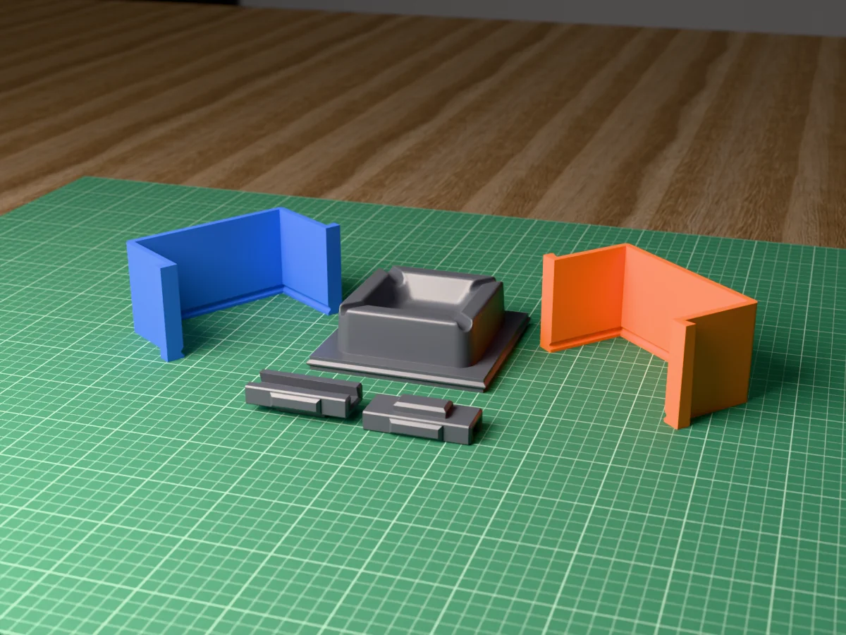 3D render of the square concrete ashtray master with four corner cigarette rests, fused on its printed charcoal base between the orange and blue walls, with the charcoal clamps behind