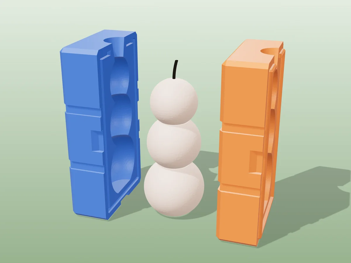 3D render of a peach stacked bubble candle of three balls between the two printed halves of its rigid blue and orange mold