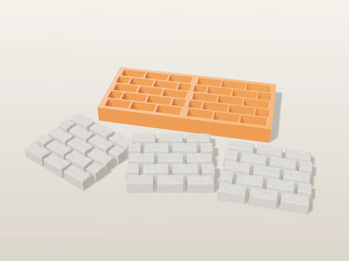 3D render of a printed orange tray with rows of stone brick cavities, and white plaster brick sprues in front