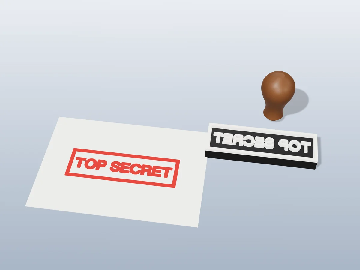 3D render of the printed top secret stamp, face up next to its brown handle, and its red ink print on a sheet of paper