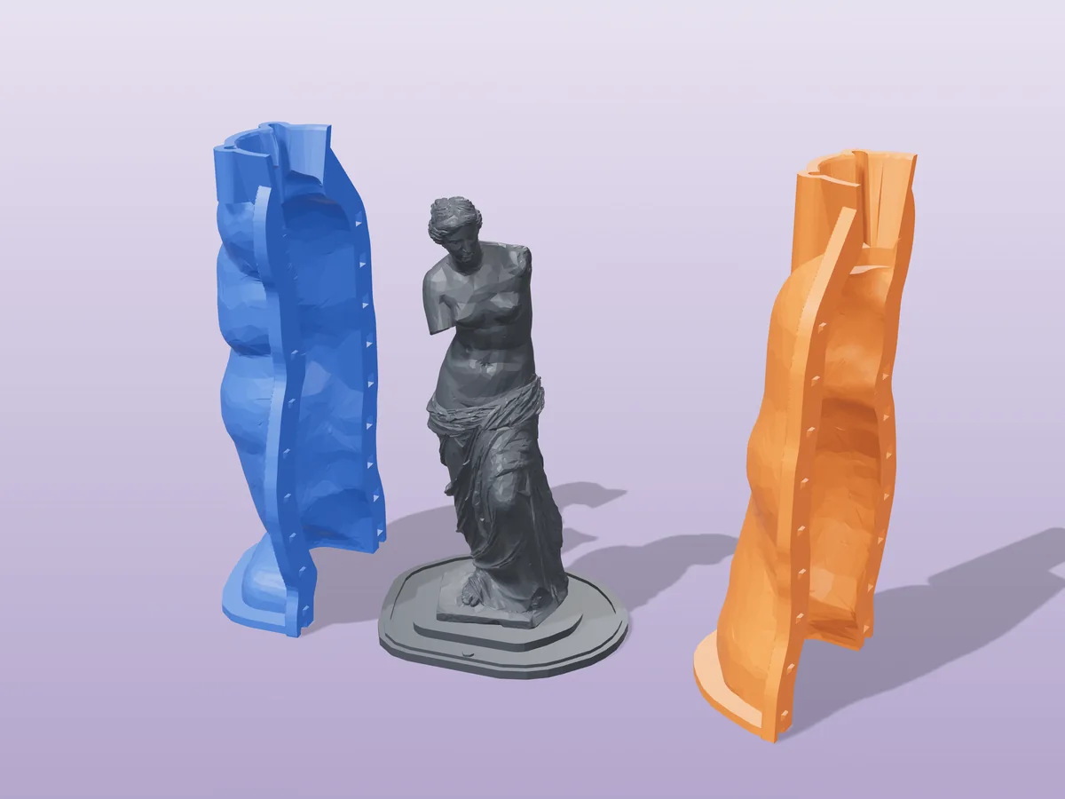 3D render of the Venus de Milo statue master fused on its printed charcoal base, between the orange and blue hugging shell halves