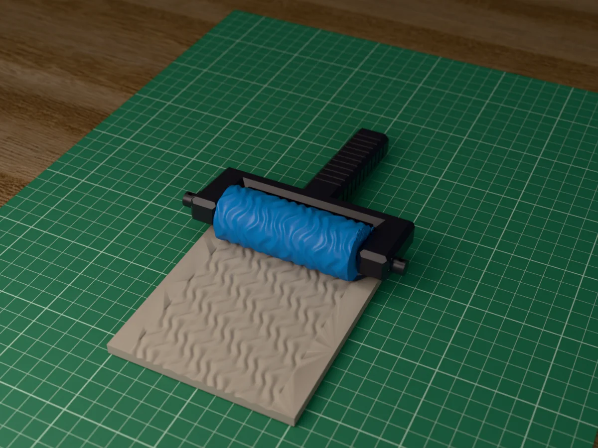 3D render of the printed wave texture roller in its dark fork handle, resting on a slab of clay it has pressed with flowing waves