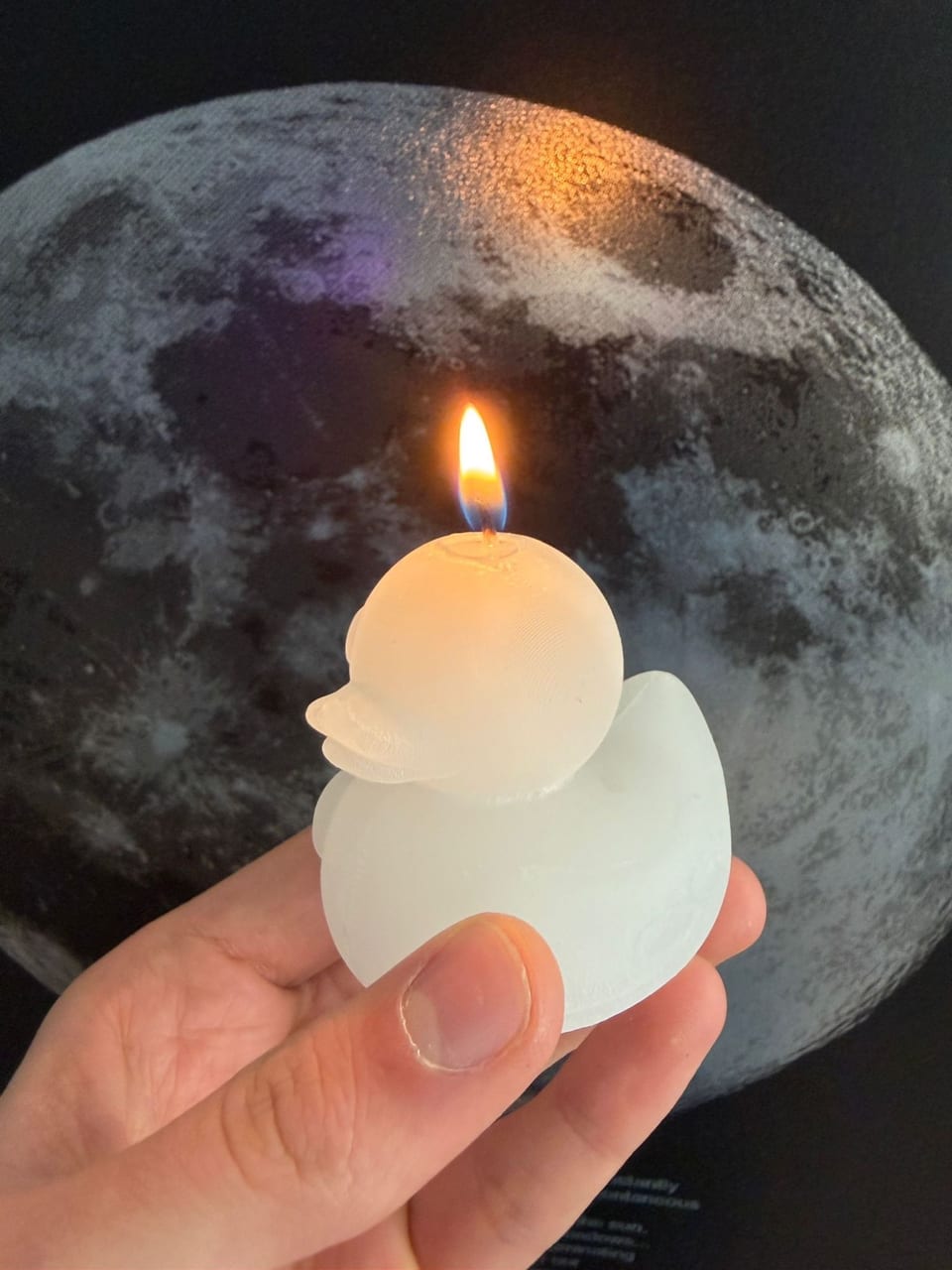 Lit rubber-duck candle made with a Meshcast mold